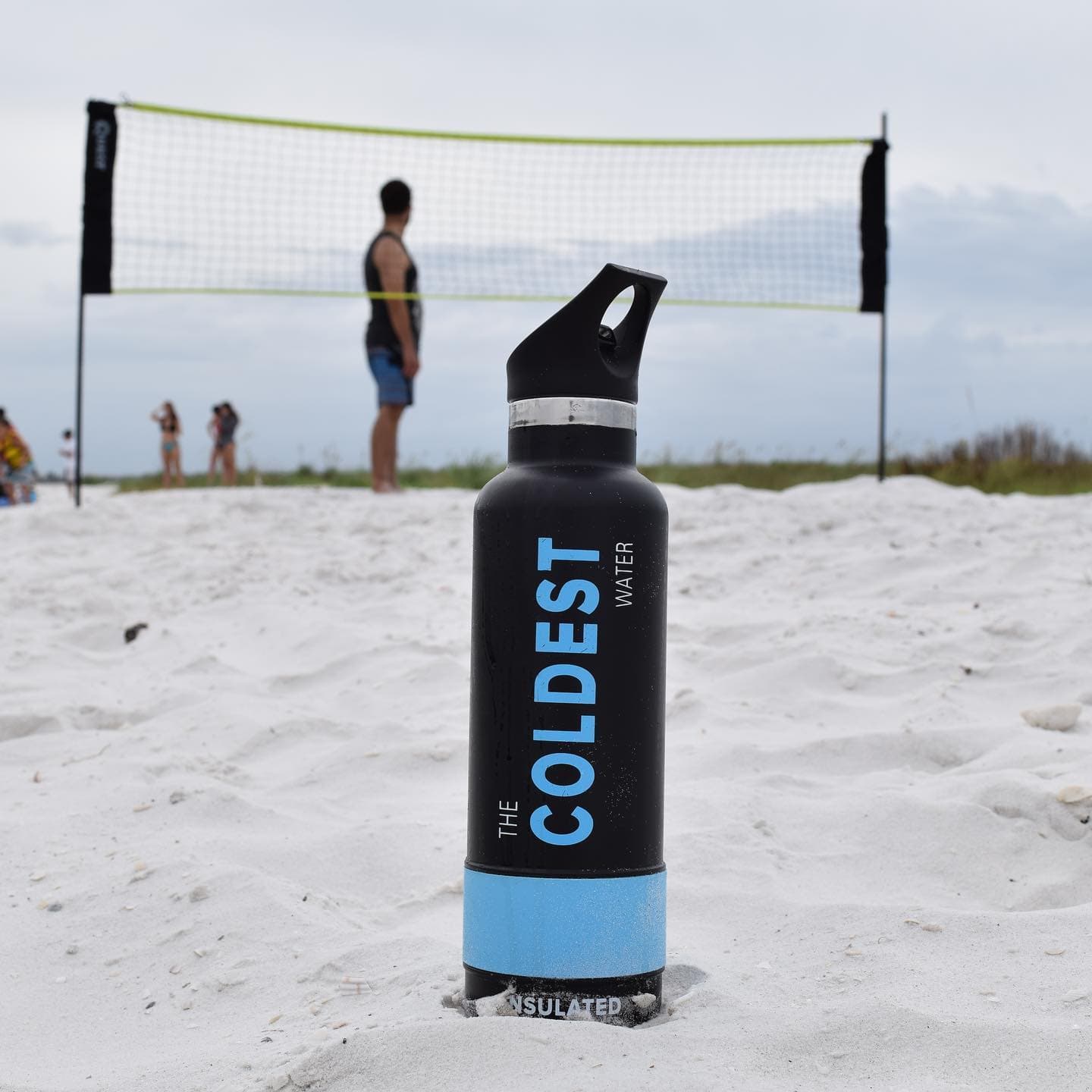 Coldest bottle at a beach volleyball game